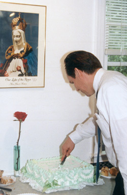 Michael cuts the cake